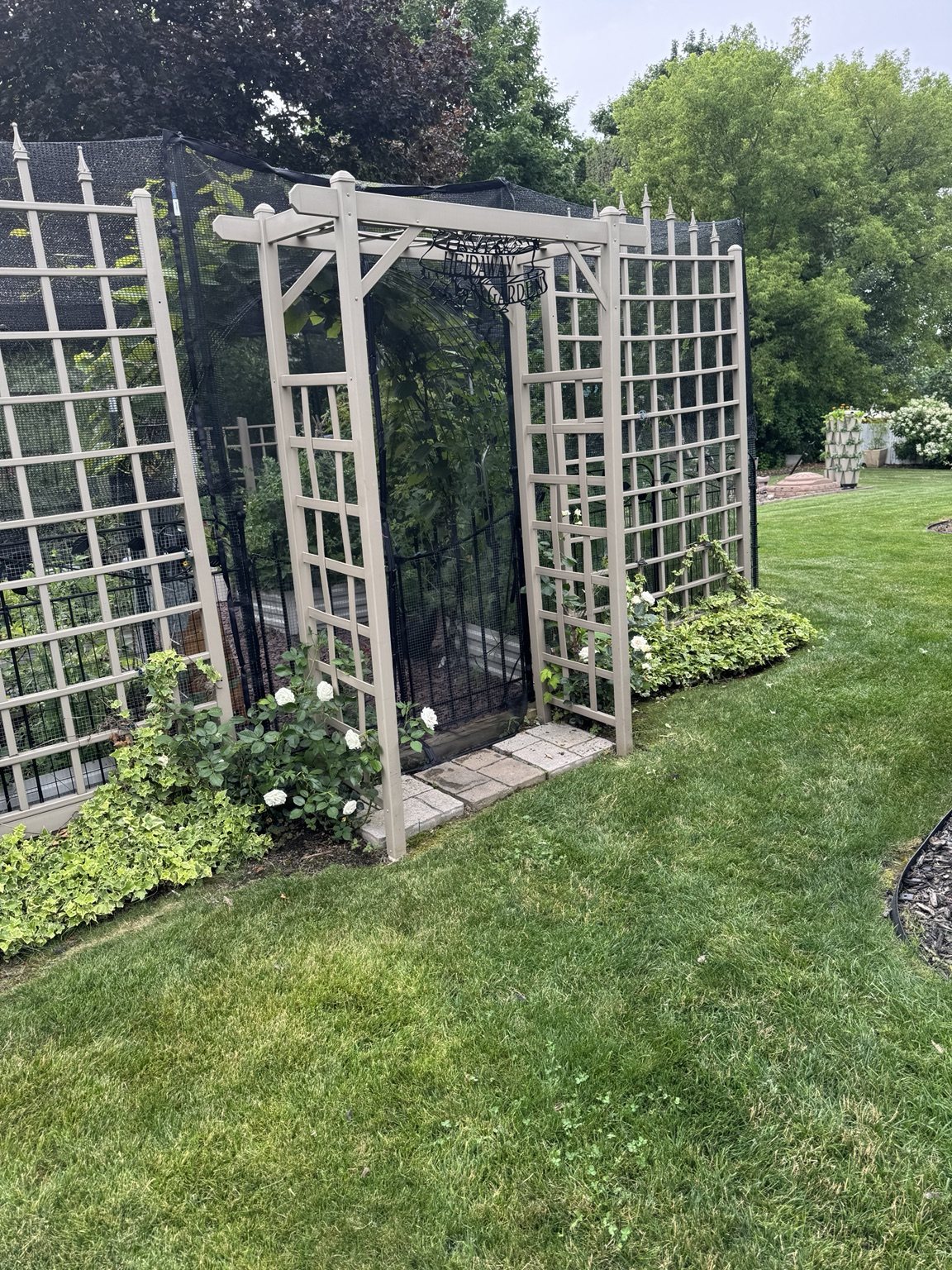 The enclosed garden entrance in summer.